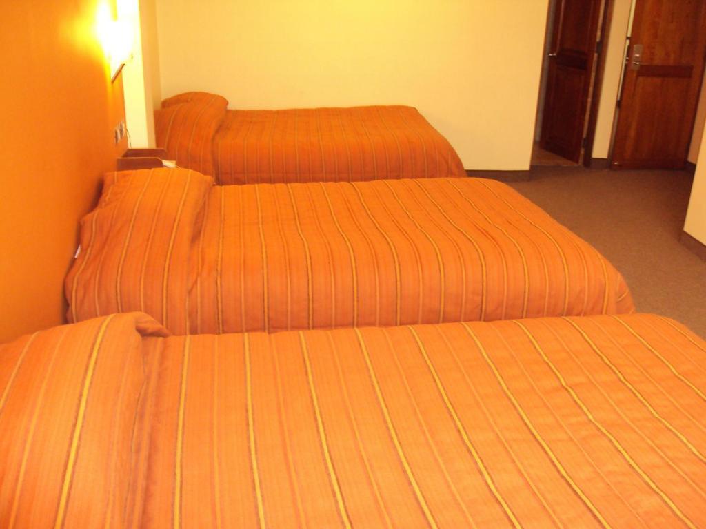 Mosoq Inn Пуно Номер фото